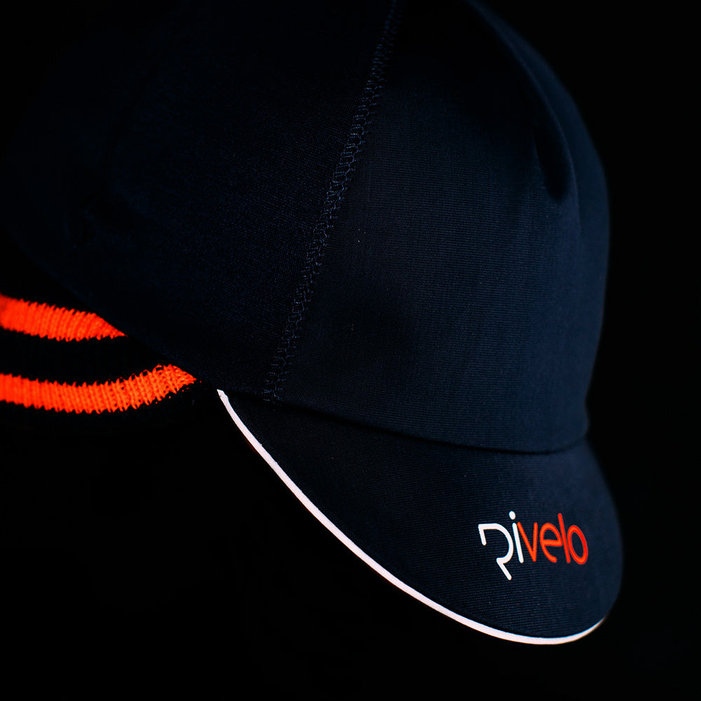 Rivelo Kensal Storm Cap (Navy/Fluro Orange)