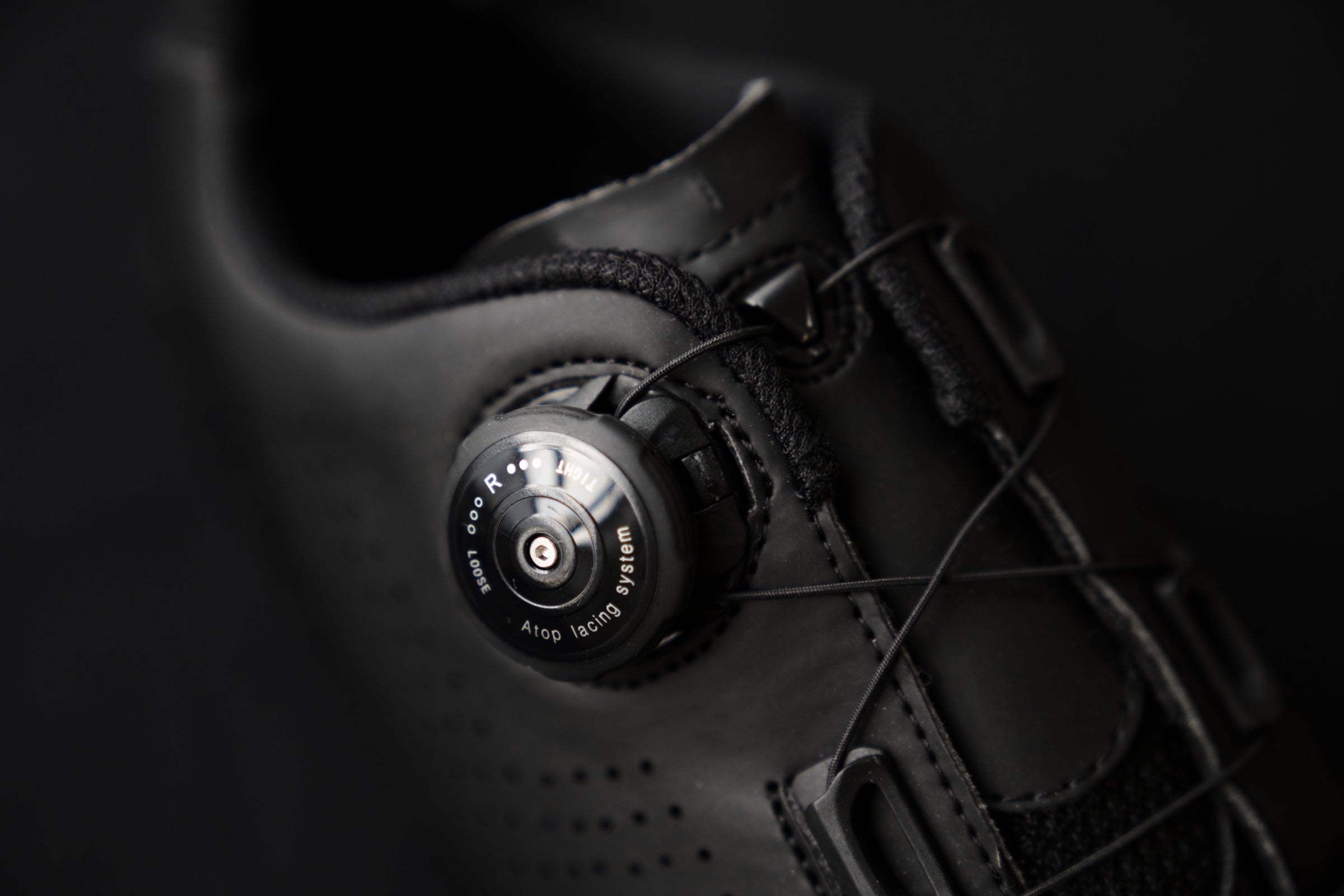 Close-up of a cycling shoe dial lacing system
