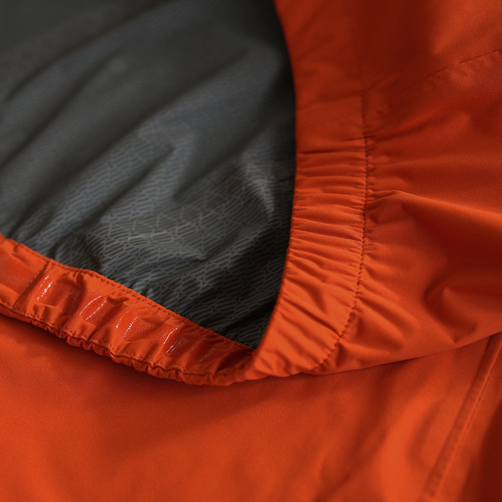 Rivelo | Mens Cairnwell High Performance Rain Jacket (Burnt Orange/Asphalt)