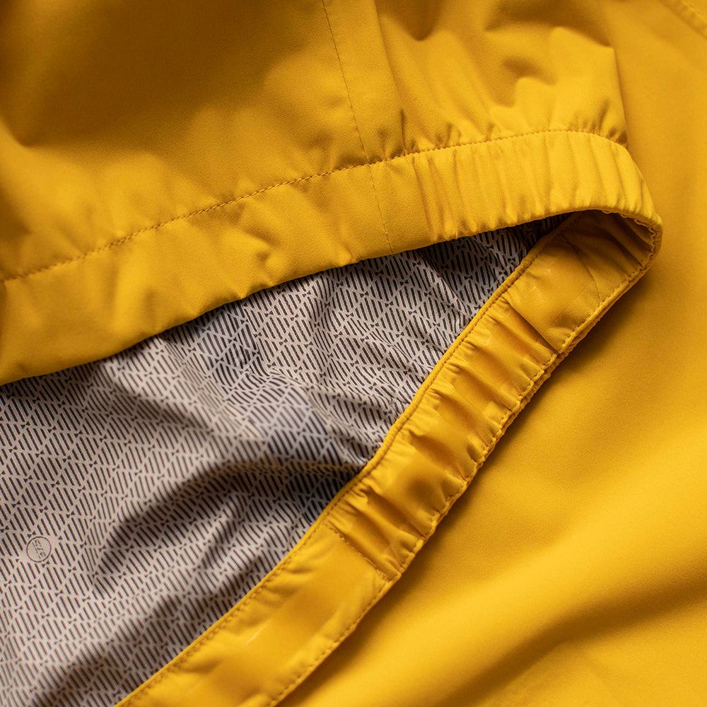 Rivelo | Mens Cairnwell High Performance Rain Jacket (Yellow/Navy)