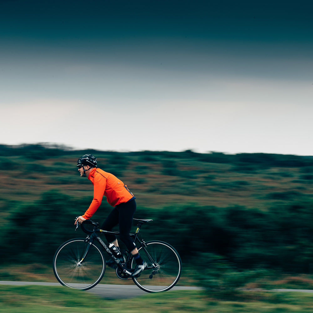 Rivelo | Mens Langcliffe High Performance Rain Jacket (Orange/Navy)