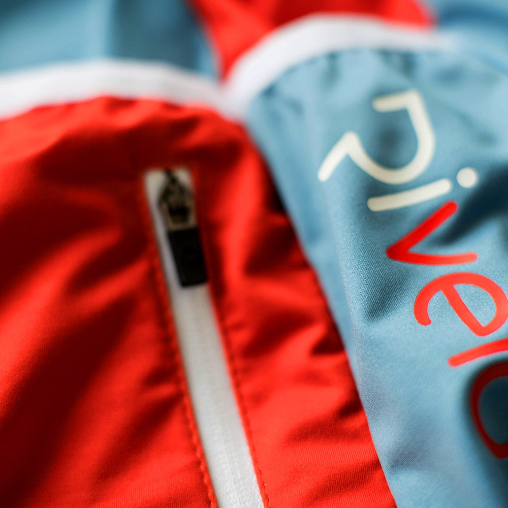 Rivelo | Mens Porlock Jersey (Blue/Orange)