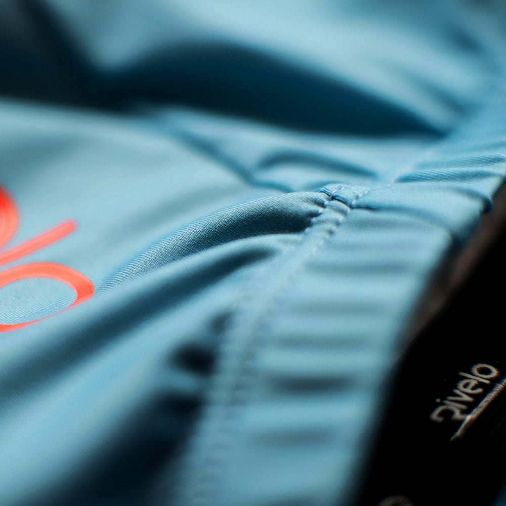 Rivelo | Mens Porlock Jersey (Blue/Orange)