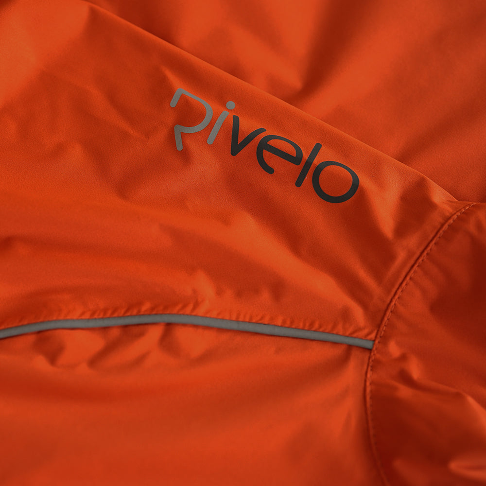 Rivelo | Womens Abington High Performance Rain Jacket (Burnt Orange/Asphalt)