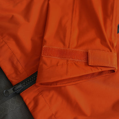 Womens Abington High Performance Rain Jacket (Burnt Orange/Asphalt)