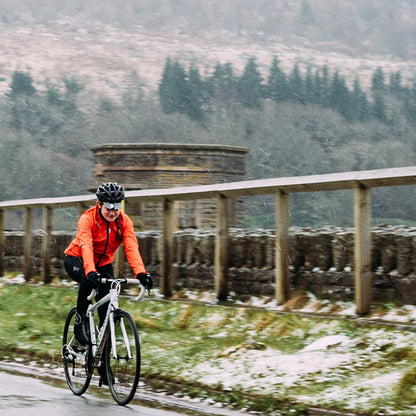 Rivelo Womens Garrowby Packable Jacket (Orange) (model: jen) (align-x: 0%)