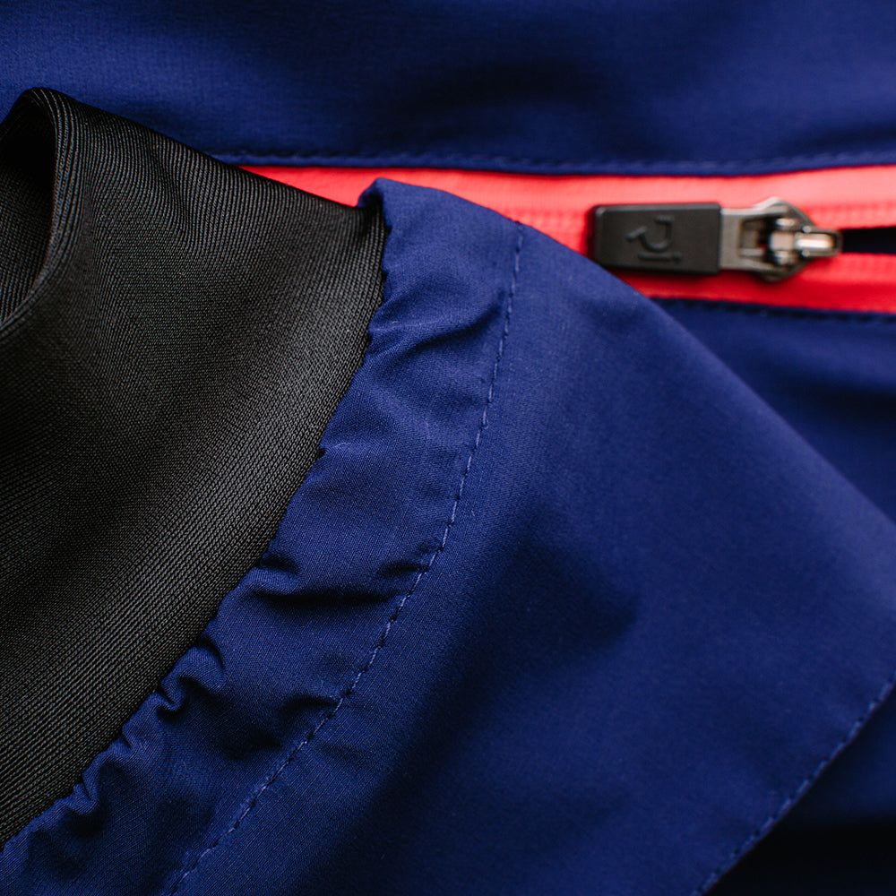 Rivelo Womens Larkstone High Performance Rain Jacket (Navy/Red)